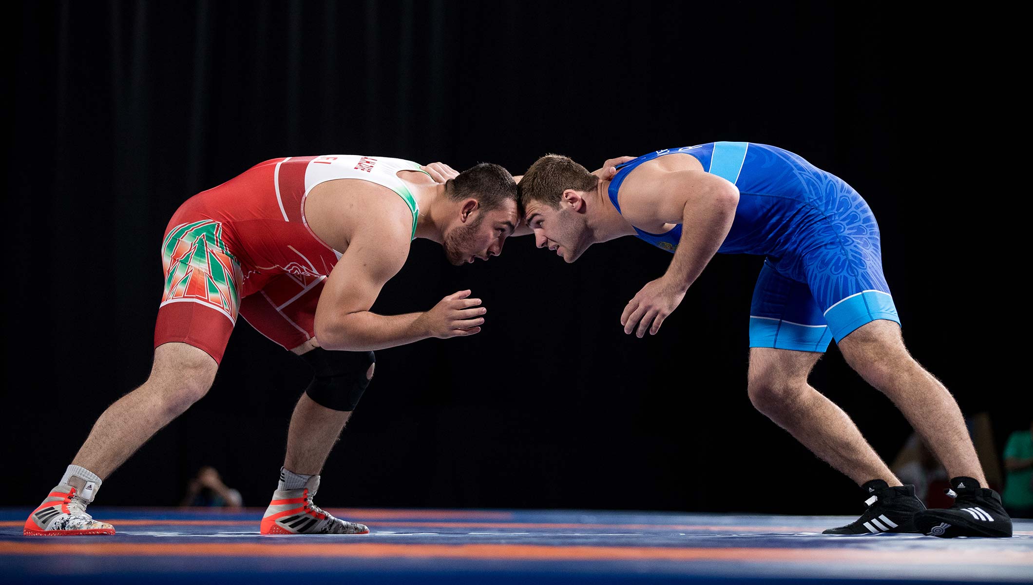 Wrestling is a combat sport involving grappling-type techniques such as cli...